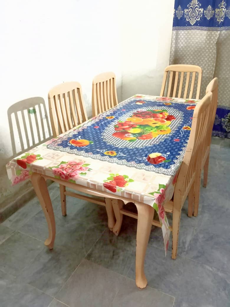 wooden dinning table with chairs 0