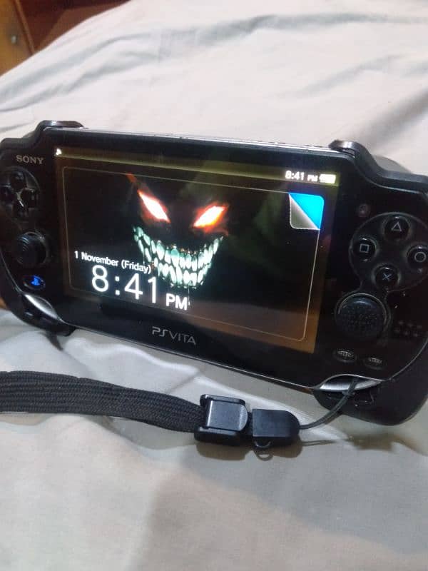 Sony PS Vita with all accessories and 3 games 5