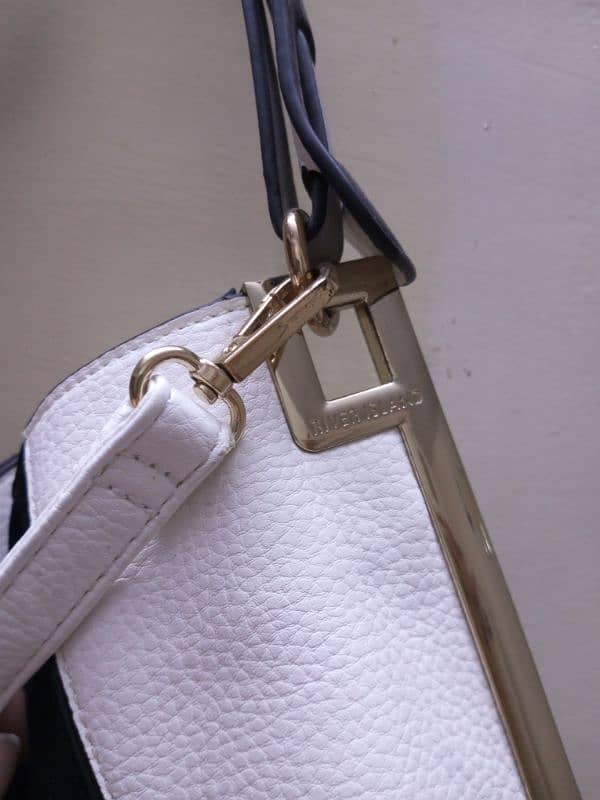 branded preloved river island bag defected 3