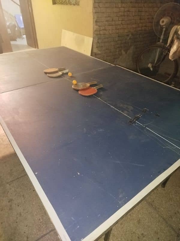 I'm selling my table tennis with rackets pair and hy ball set 1