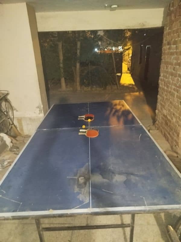 I'm selling my table tennis with rackets pair and hy ball set 2