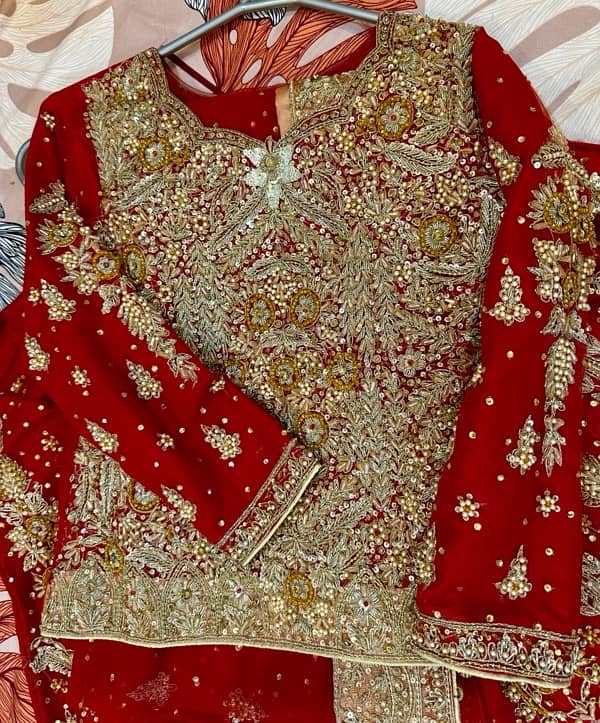 Beautiful Bridal Lehenga having embroidery on net fabric! 9