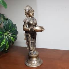 Antique heavy brass lady holding dish 1.5 kg weight 9" height