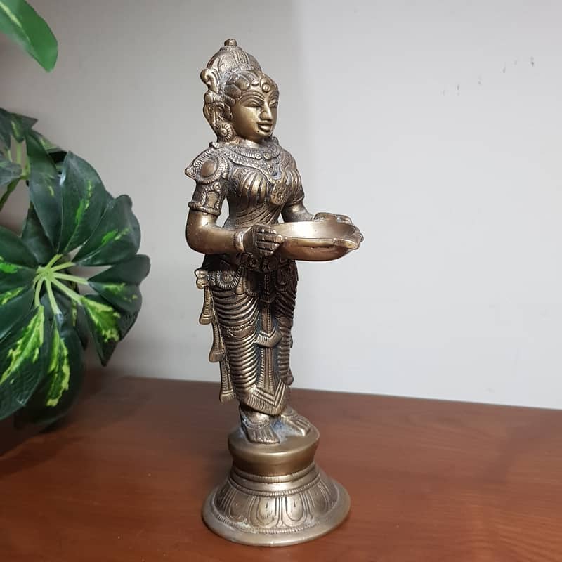 Antique heavy brass lady holding dish 1.5 kg weight 9" height 0