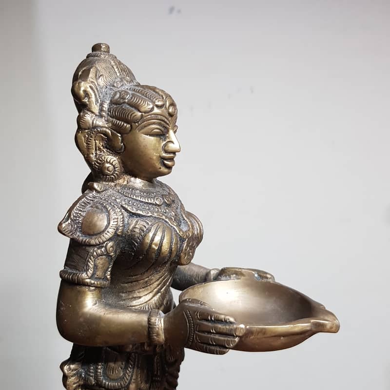 Antique heavy brass lady holding dish 1.5 kg weight 9" height 1