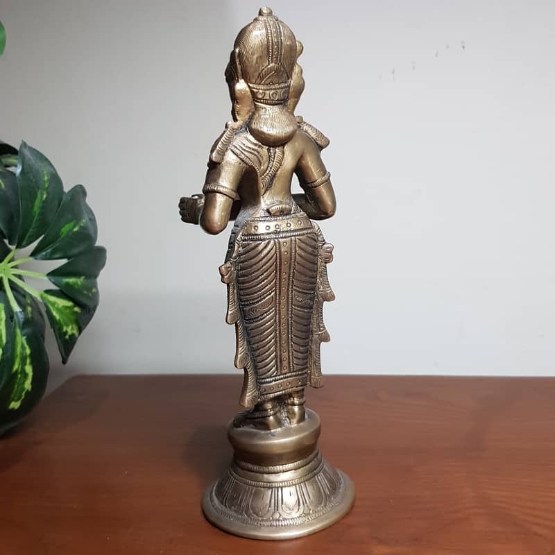 Antique heavy brass lady holding dish 1.5 kg weight 9" height 2