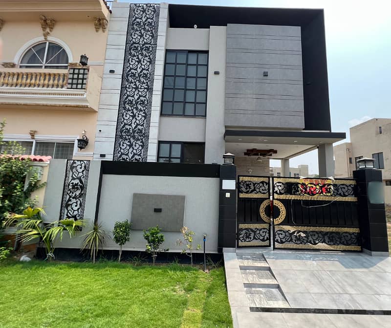 "4-Bedroom 5-Marla House For Sale In DHA Phase 9 Town Block C: Modern Design And Top-Quality Finishes" 0