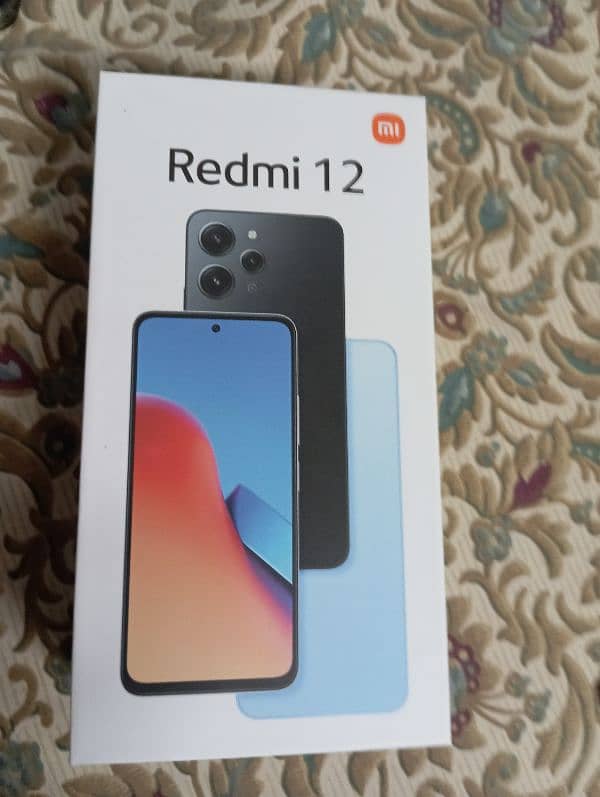 redmi 12.8/256  pta approved with complete box nly tow month use 1