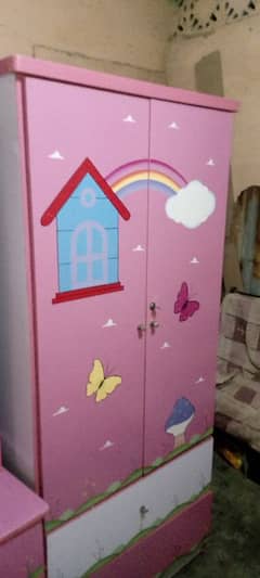 kids wardrobe and study table