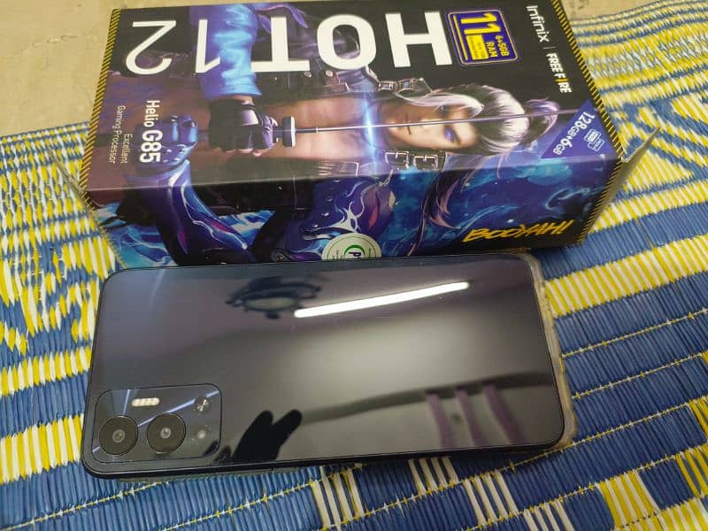 infinix hot 12 5/6 128gb with 10/10 new condition 1