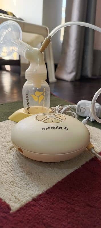 Medela Swing Branded Electric Breasts pump 1