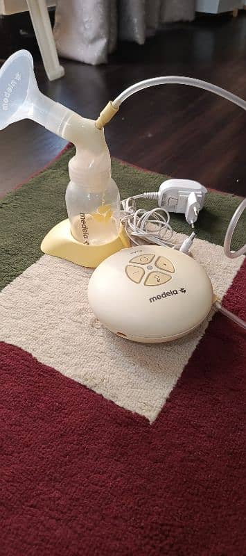 Medela Swing Branded Electric Breasts pump 4