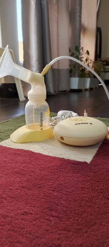 Medela Swing Branded Electric Breasts pump 9