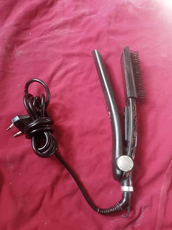 vetan condition mein Hair Straightener hai 0