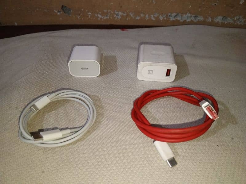 oneplus and iphone charger lush condition 1