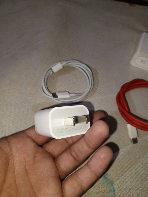 oneplus and iphone charger lush condition 6