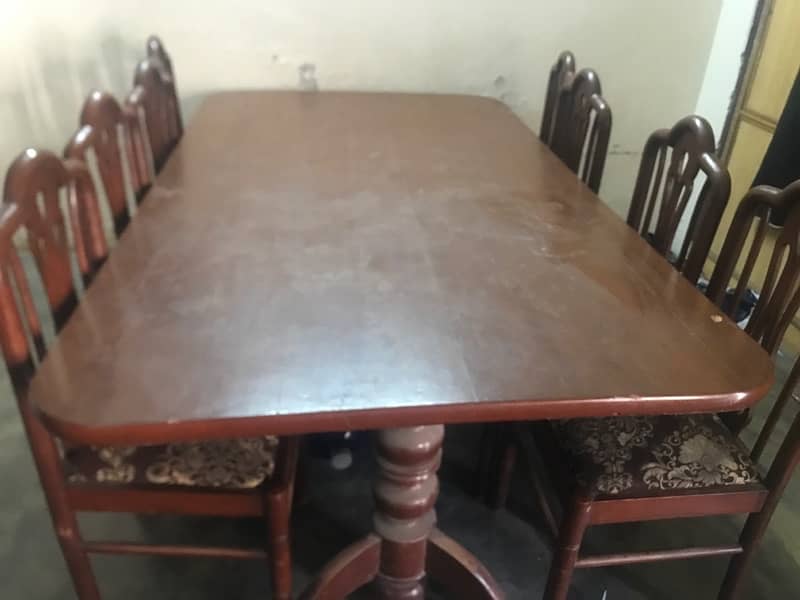 wooden table for sale with 8 chairs 2