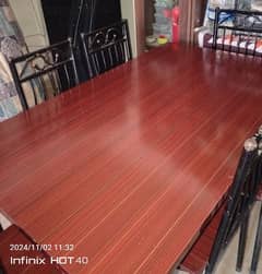 6 chair iron dining table good condition .