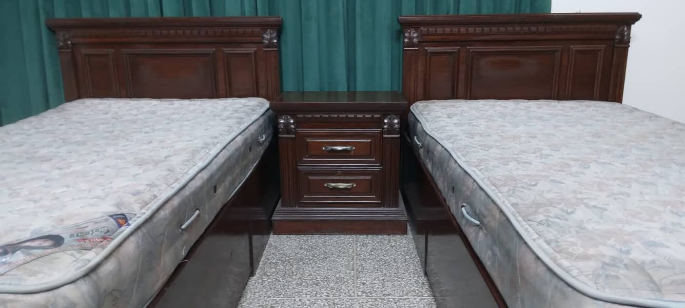 wooden 2 single beds / single bed set with mattresses / center table 0