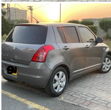 Suzuki Swift 2014 1.3 DLX . Excellent interior 5