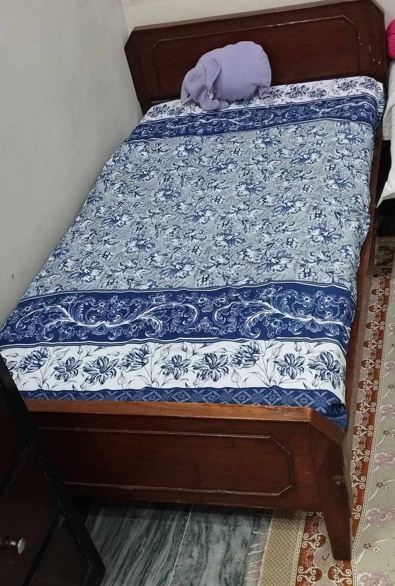 Wooden single Bed 0