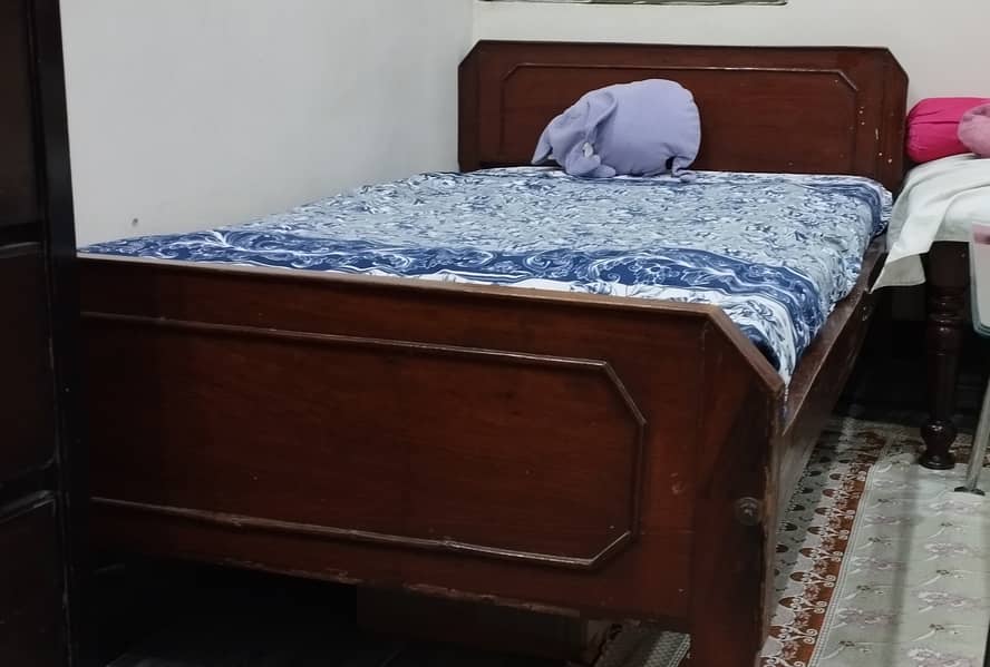 Wooden single Bed 1