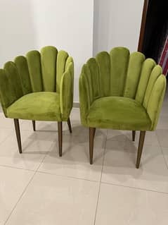 Green velvet arm chairs