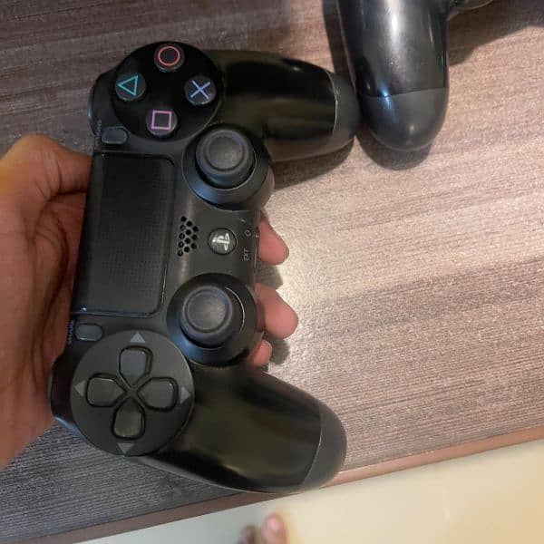 PS4 slim with two controllers 1