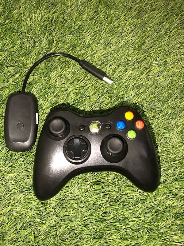 X box 360 new wireless controller and can also use with wire 1