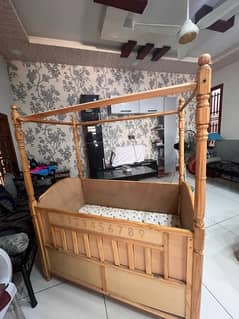 Wooden baby carry cot