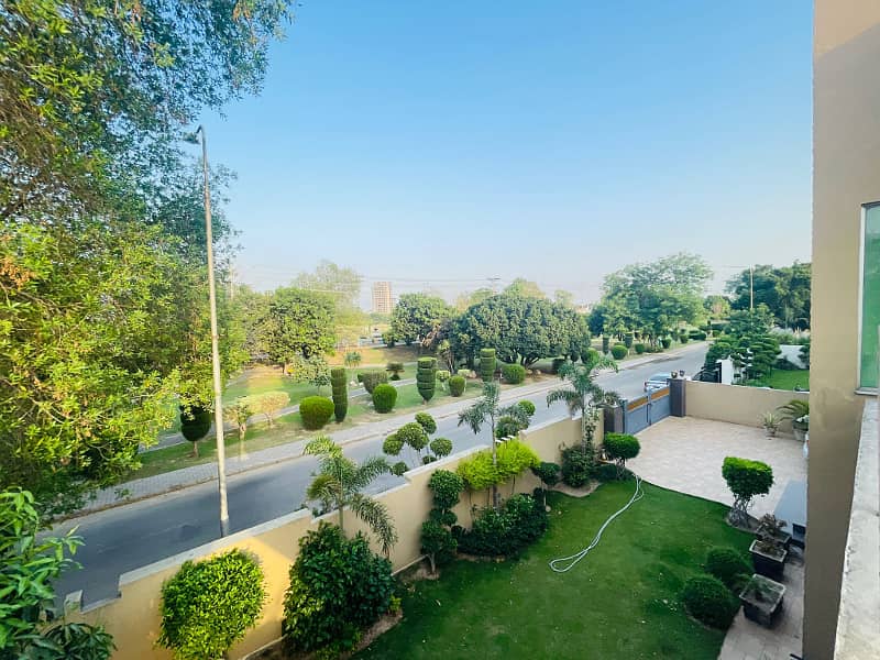 2 Kanal Facing Park Facing Canal Fully Furnished Triple Floor House with swimming pool, Mini Theater and Basement at the prime location of main Canal Road Babar Block, Bahria Town Lahore 13