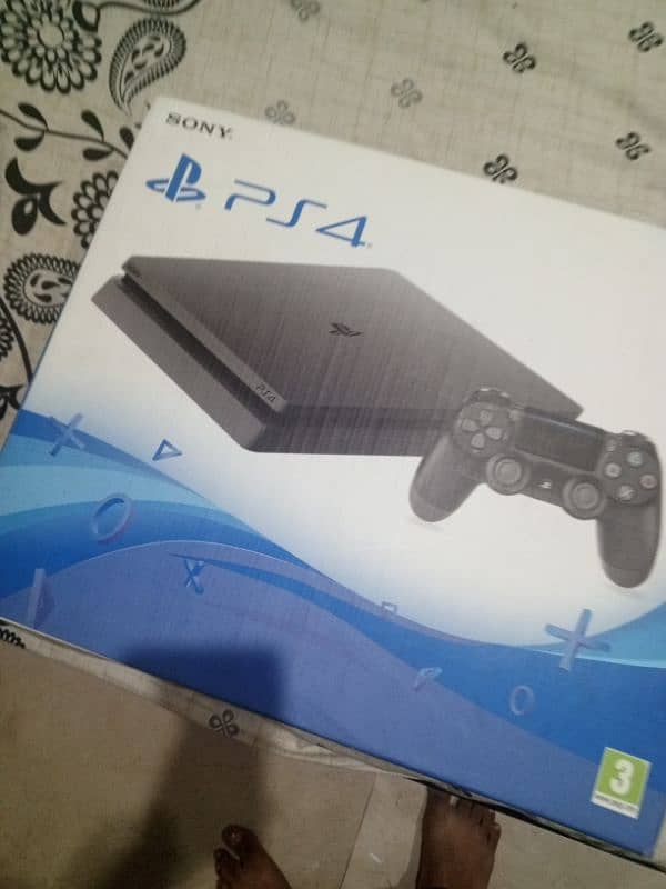 PS4 SLIM 1TB WITH BOX 10 DAYS USED 10 BY 10 0