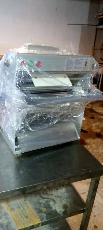 hot plate, fryer, pizza oven conveyor, dough rooler, prep table 3