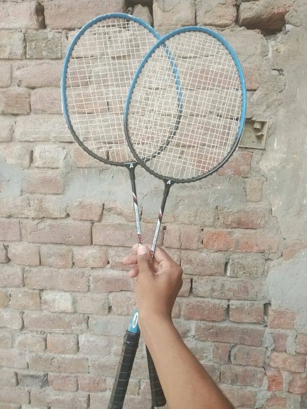 badminton racket. 0