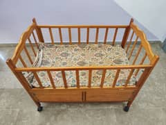 Baby cot with swing