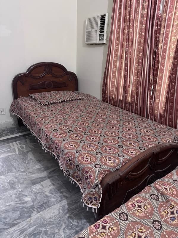 2 single wooden beds for sale 0