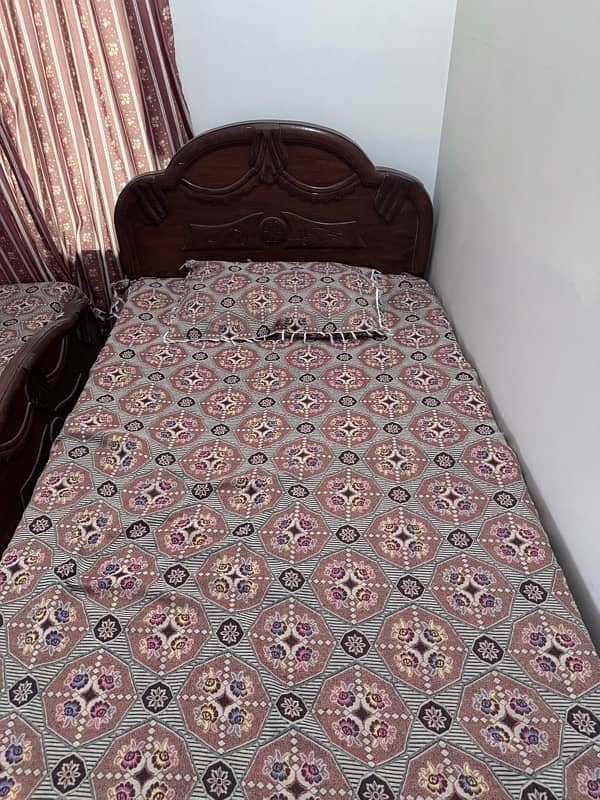 2 single wooden beds for sale 2