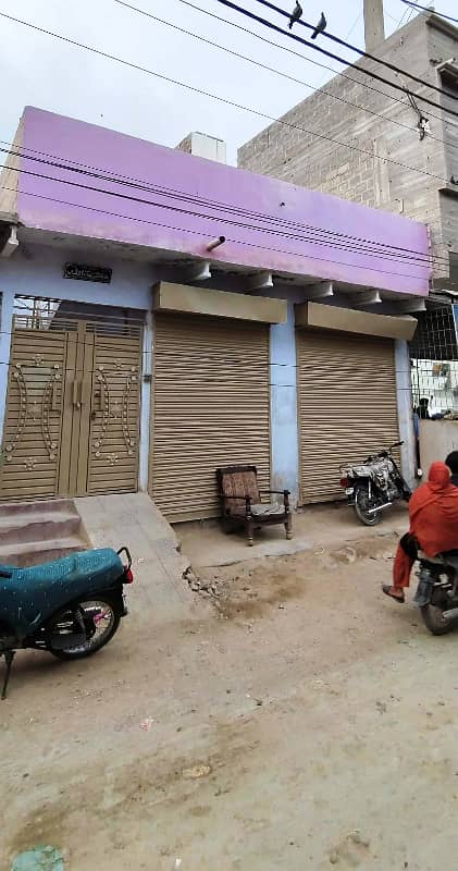 House for sell with Two Shops On link Road 1