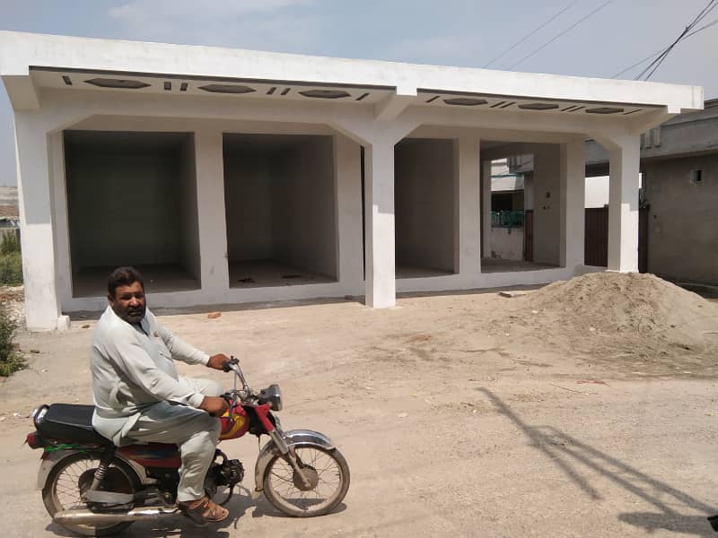 8 Marla market corner comrshl main Tarbela Road 0