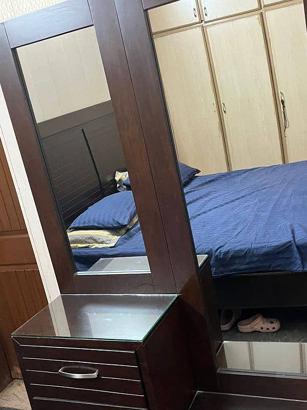 wooden bed in use 1