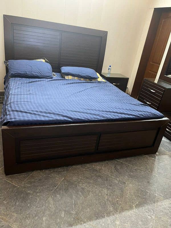 wooden bed in use 2