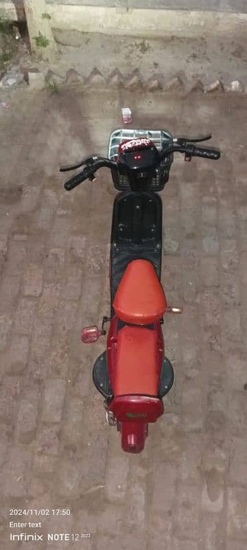 electric scooty with paidals 4