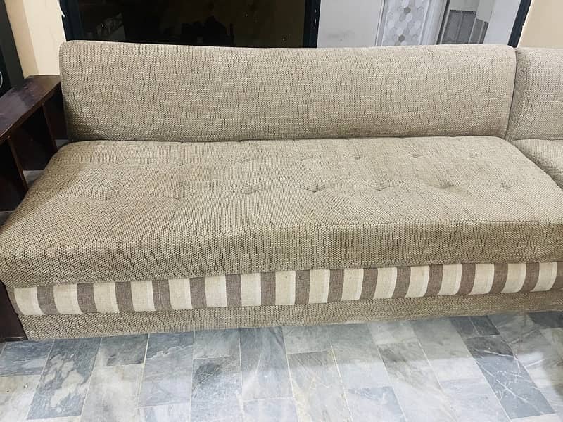 L shape sofas with five cushions 2