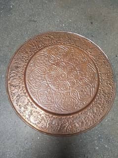 two copper wallhanging one foot diameter