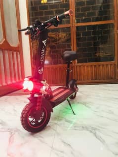 electric scootey import from dubai