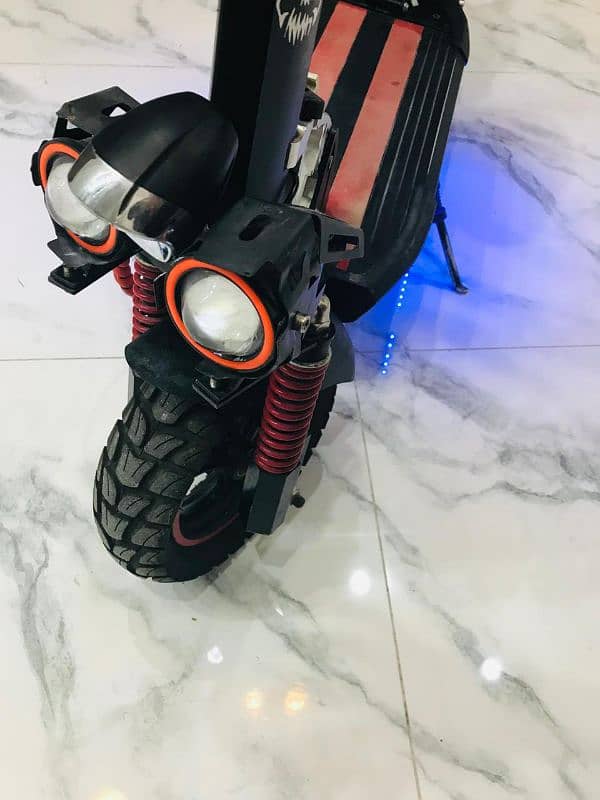 electric scootey import from dubai 2