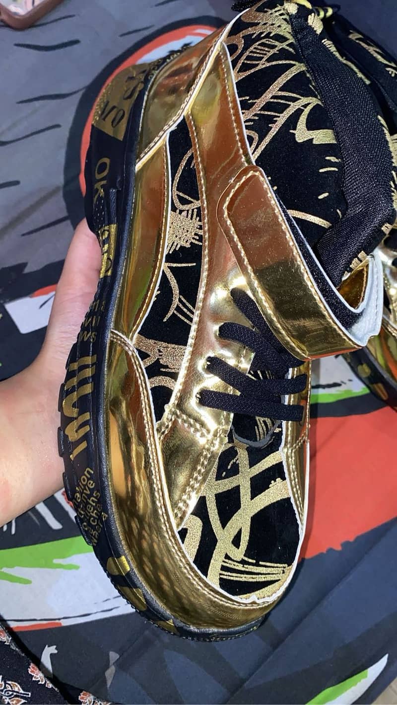 Brand new gold sneakers imported from dubai 1