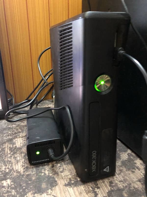 Xbox 360 with 15 games 1 month used price 26k 0