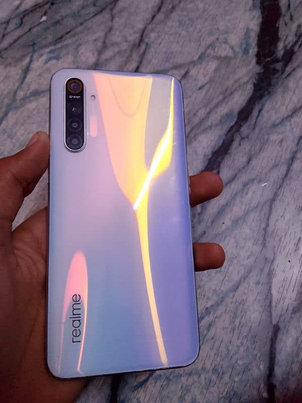 Realme xt mobile phone 4