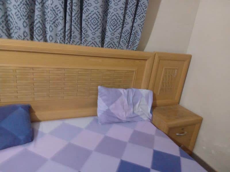 king bed without matters.    side tables dressing and 3 door cupboard 3